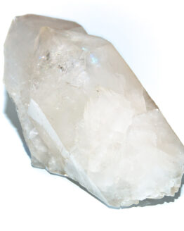 Large double pointed clear quartz crystal over white